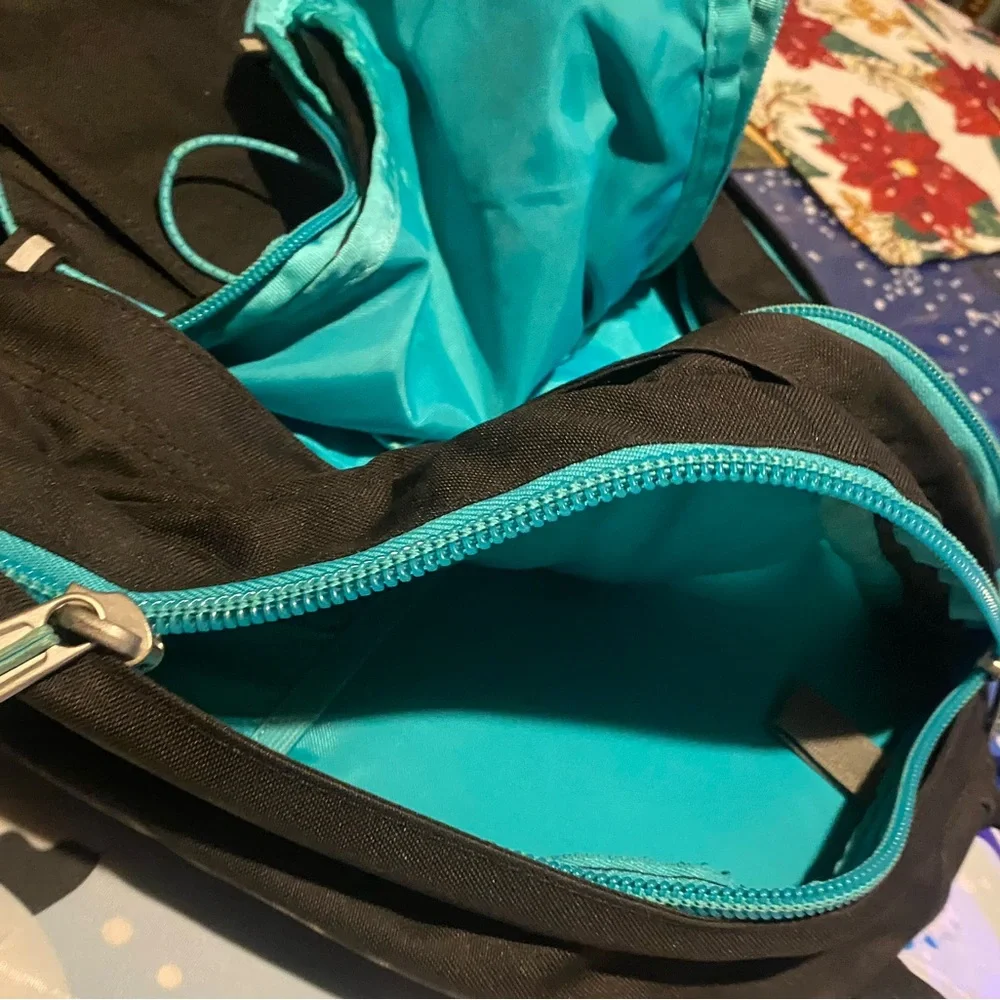 The North Face Jester Black Backpack with Teal Straps